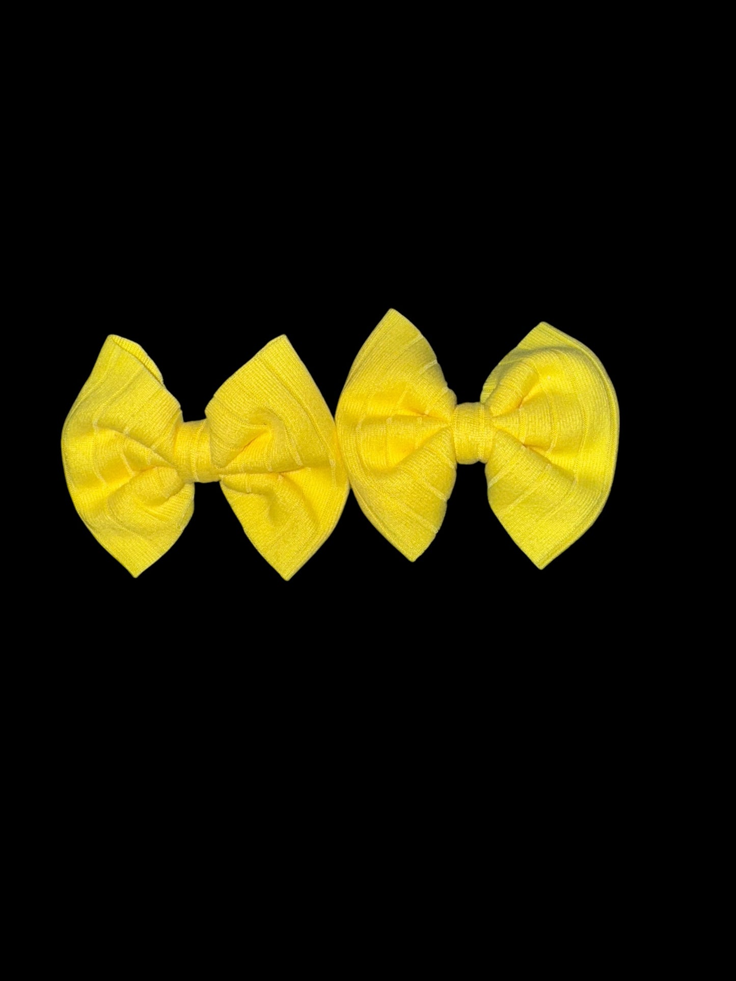 Yellow piggy clip bows