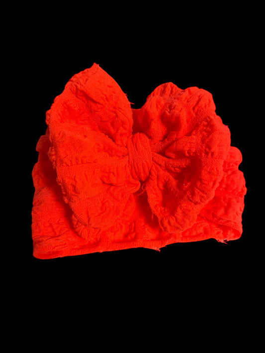 Puffy orange headwrap bow