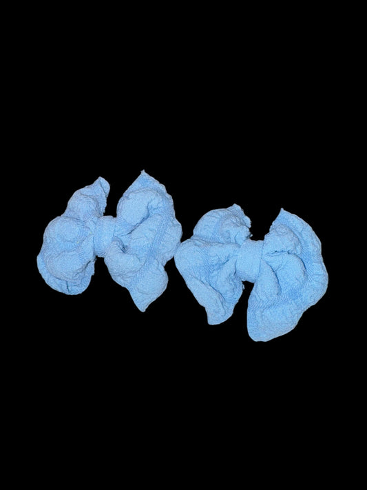 Blue piggy clip bows